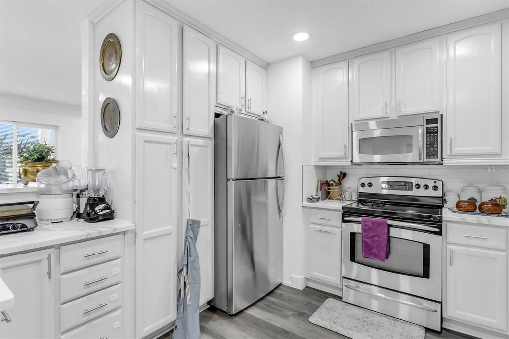 Interior, Kitchen, Recessed Lighting, Stainless Steel Appliances, Wood Texture Flooring