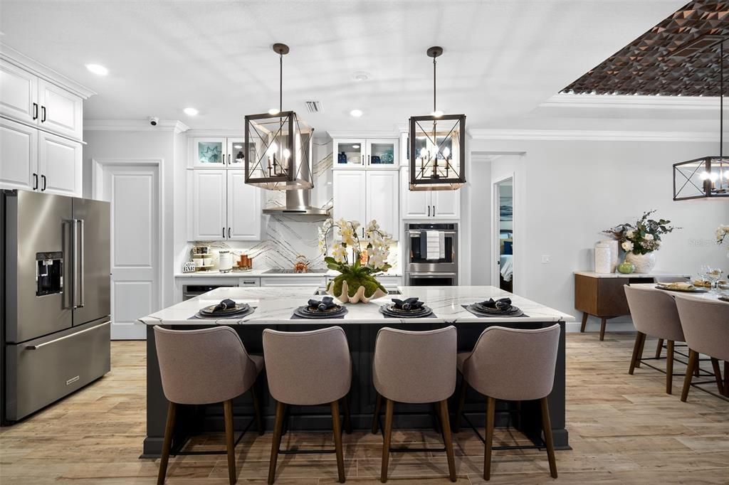 Dining room, Interior, Kitchen, Pendant Lights, Recessed Lighting, Stainless Steel Appliances, Wood Texture Flooring
