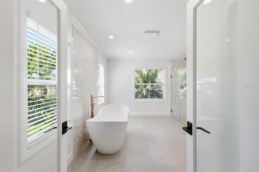 Bathroom, Free Standing Baths, Glass Shower, Interior, Marble Walls, Recessed Lighting