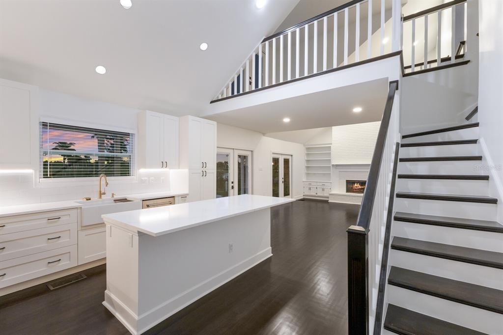 Fireplace, Interior, Kitchen, Recessed Lighting, Wood Texture Flooring
