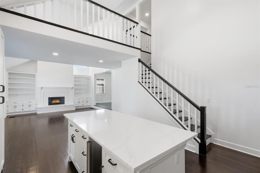 Fireplace, Interior, Kitchen, Recessed Lighting, Wood Texture Flooring