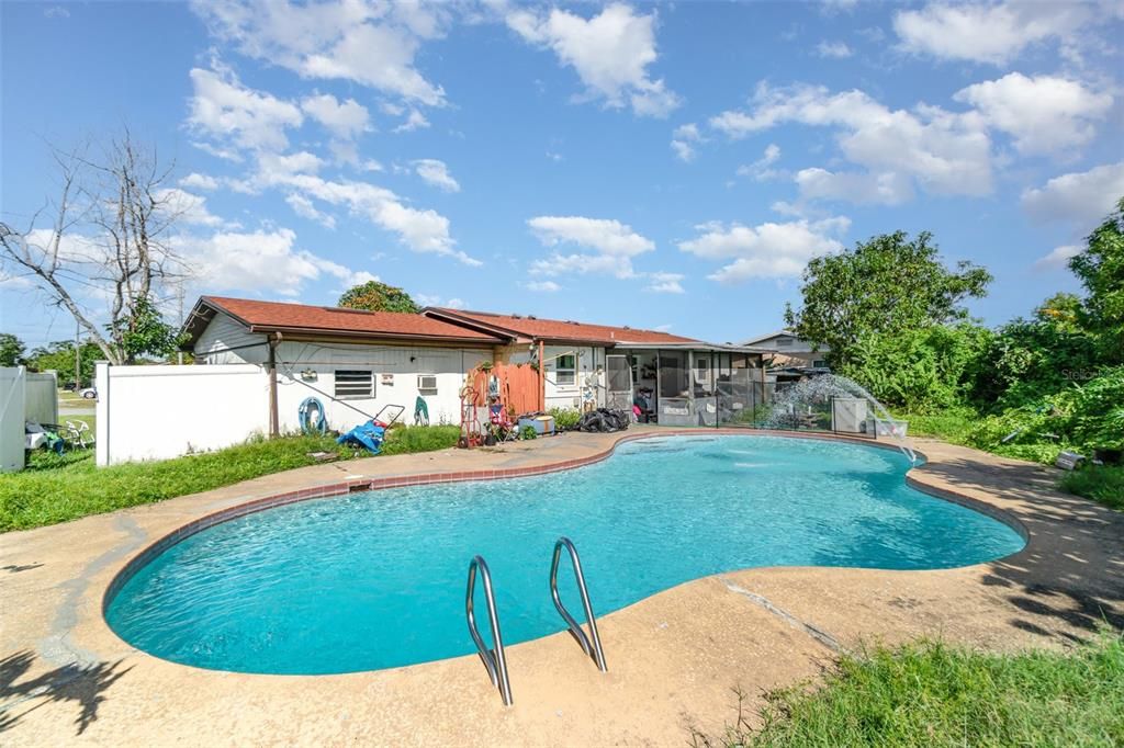 Exterior, Pool, Solar Panels