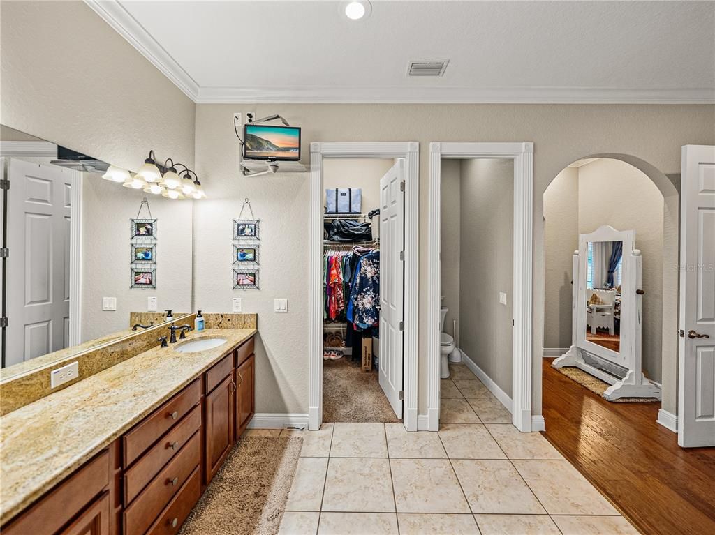 Bathroom, Dual Sink Vanities, Interior, Recessed Lighting, Walk-in Closets, Wood Texture Flooring