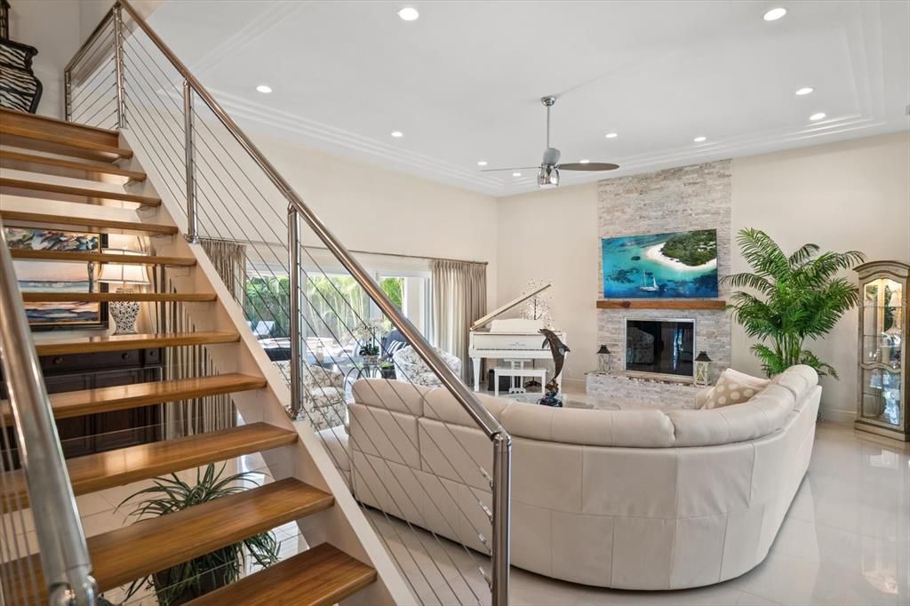 Fireplace, Interior, Living room, Piano, Recessed Lighting, Stone Walls