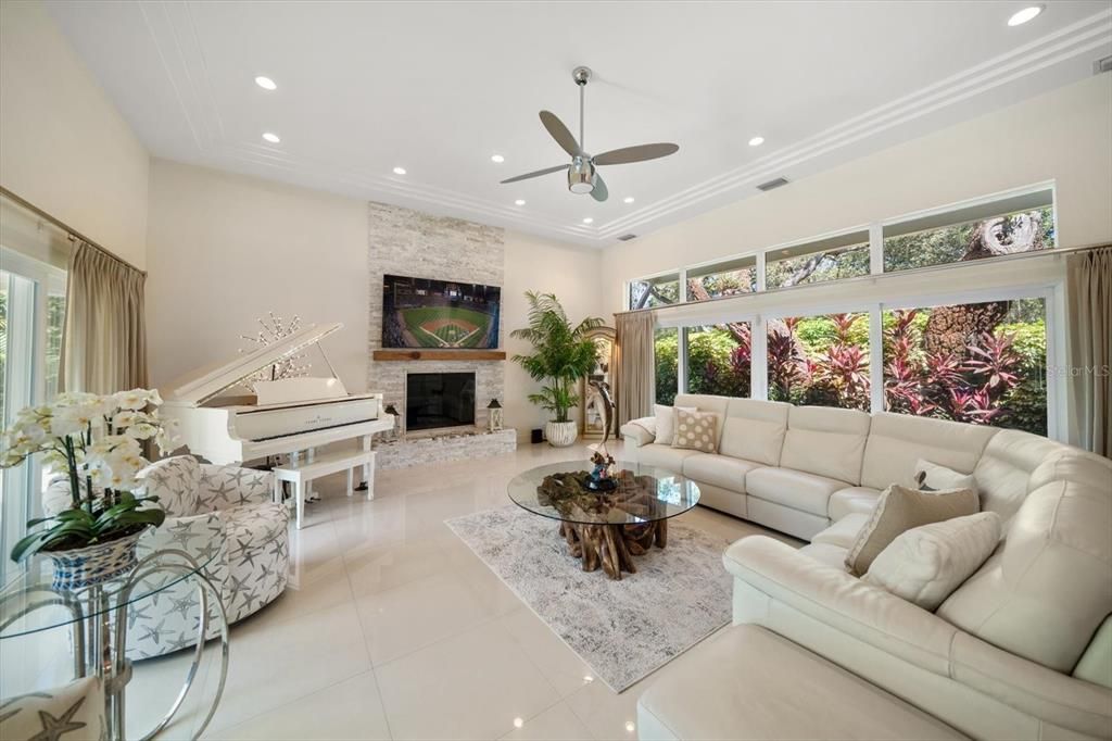 Fireplace, Interior, Living room, Piano, Recessed Lighting, Stone Walls