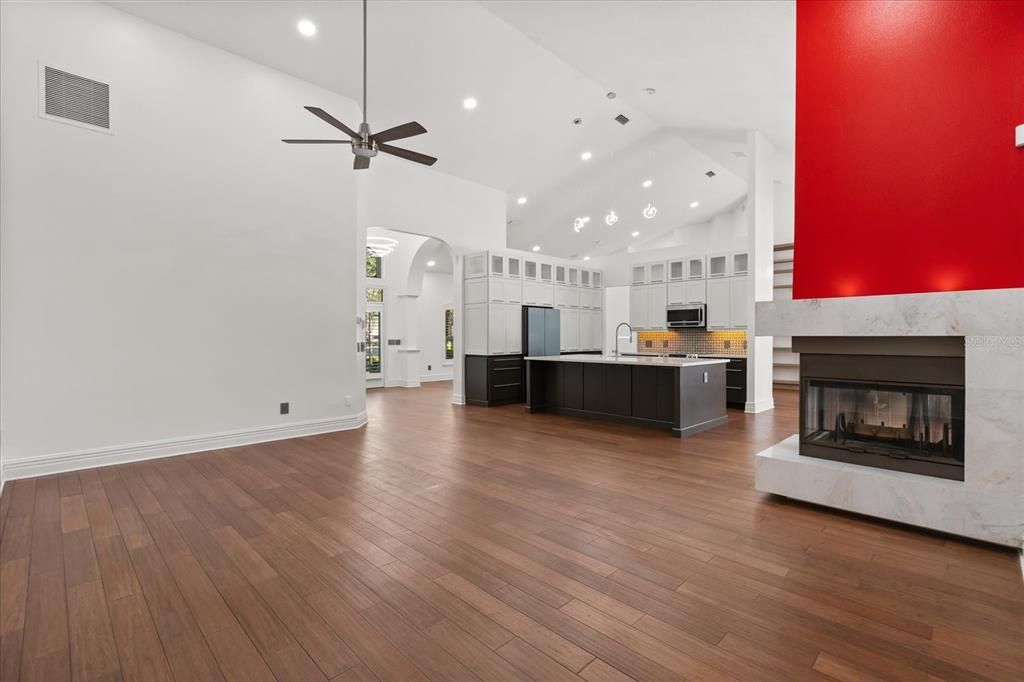 Fireplace, Interior, Kitchen, Pendant Lights, Recessed Lighting, Stainless Steel Appliances, Wood Texture Flooring