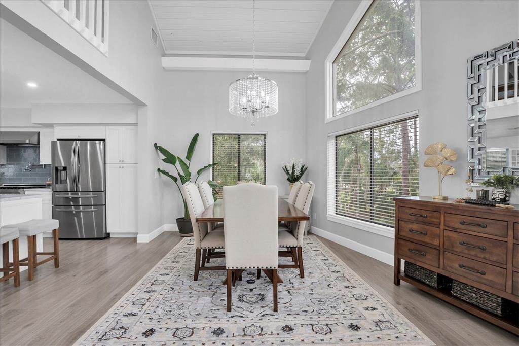 Chandelier, Dining room, Interior, Kitchen, Recessed Lighting, Stainless Steel Appliances, Wood Texture Flooring