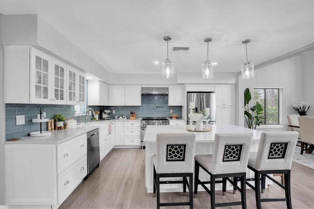 Dining room, Interior, Kitchen, Pendant Lights, Recessed Lighting, Stainless Steel Appliances, Wood Texture Flooring