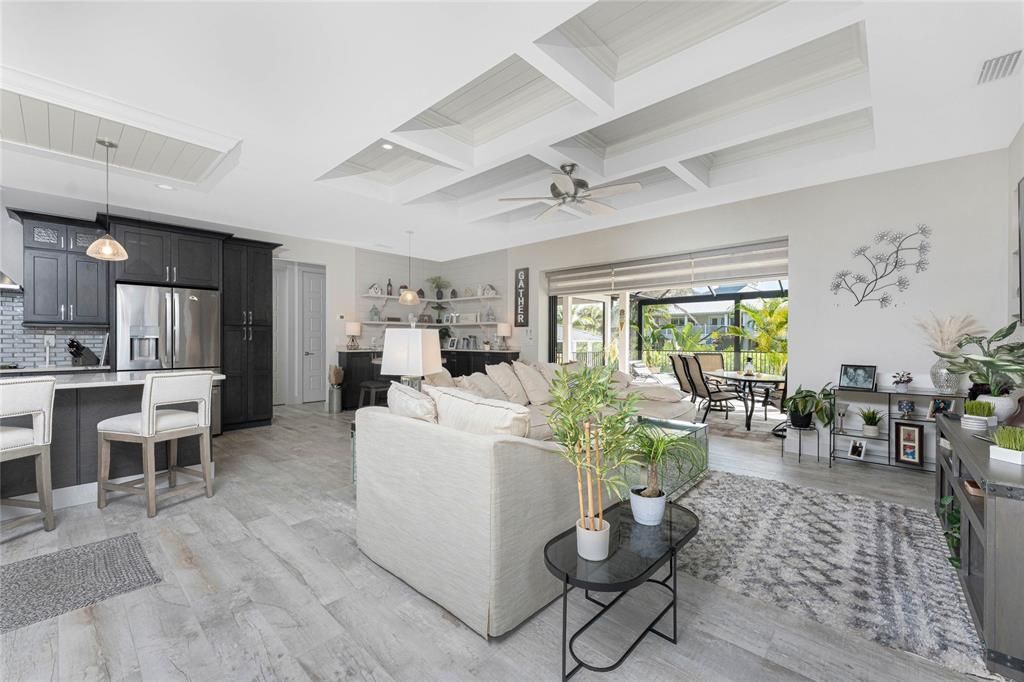 Dining room, Interior, Kitchen, Living room, Pendant Lights, Recessed Lighting, Stainless Steel Appliances, Wood Texture Flooring