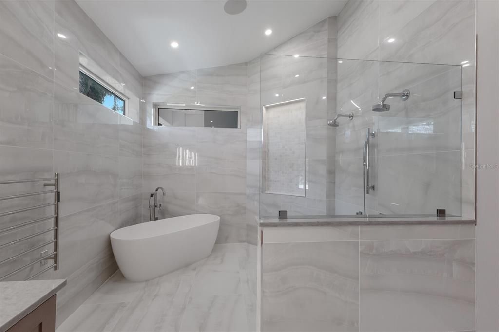 Bathroom, Free Standing Baths, Glass Shower, Interior, Marble, Marble Walls, Recessed Lighting