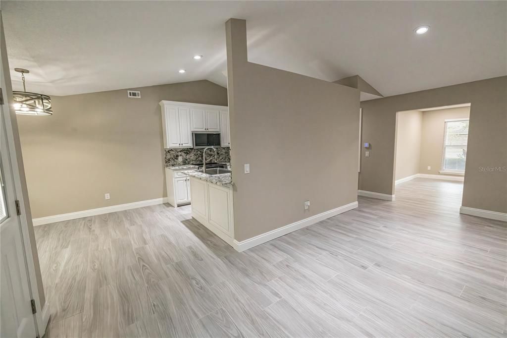 Empty room, Interior, Kitchen, Pendant Lights, Recessed Lighting, Wood Texture Flooring