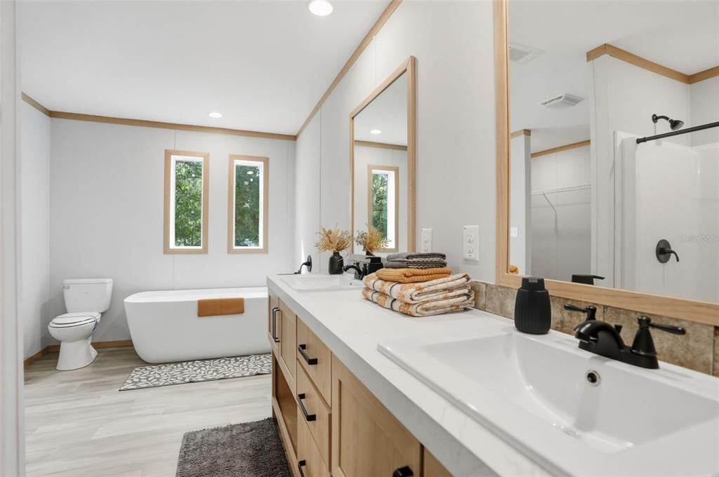 Bathroom, Dual Sink Vanities, Free Standing Baths, Interior, Recessed Lighting, Wood Texture Flooring
