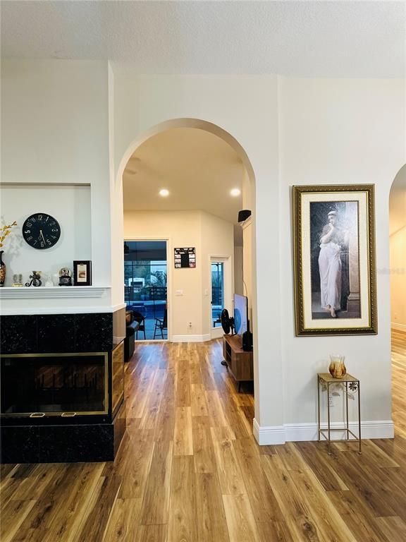 Fireplace, Interior, Recessed Lighting, Wood Texture Flooring