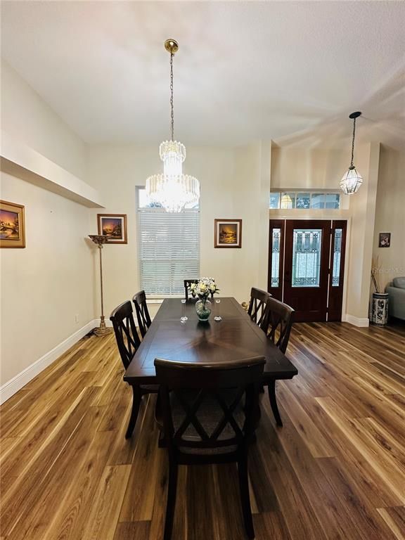 Chandelier, Dining room, Interior, Pendant Lights, Wood Texture Flooring