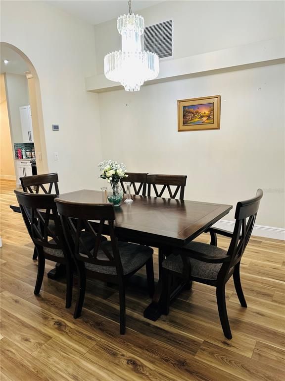 Chandelier, Dining room, Interior, Wood Texture Flooring