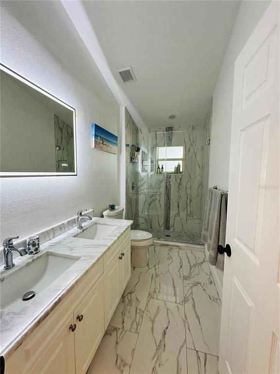 Bathroom, Dual Sink Vanities, Glass Shower, Interior, Marble, Marble Walls