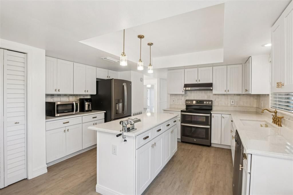 Interior, Kitchen, Pendant Lights, Recessed Lighting, Stainless Steel Appliances, Wood Texture Flooring