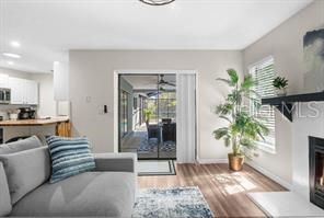 Fireplace, Interior, Kitchen, Living room, Recessed Lighting, Wood Texture Flooring