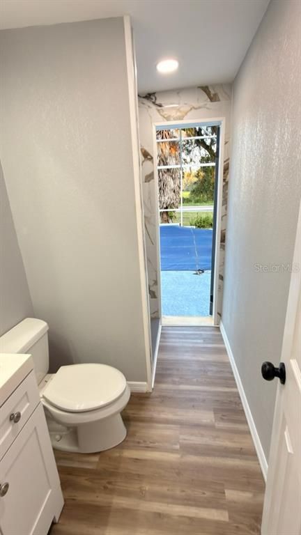 Bathroom, Interior, Marble Walls, Recessed Lighting, Wood Texture Flooring