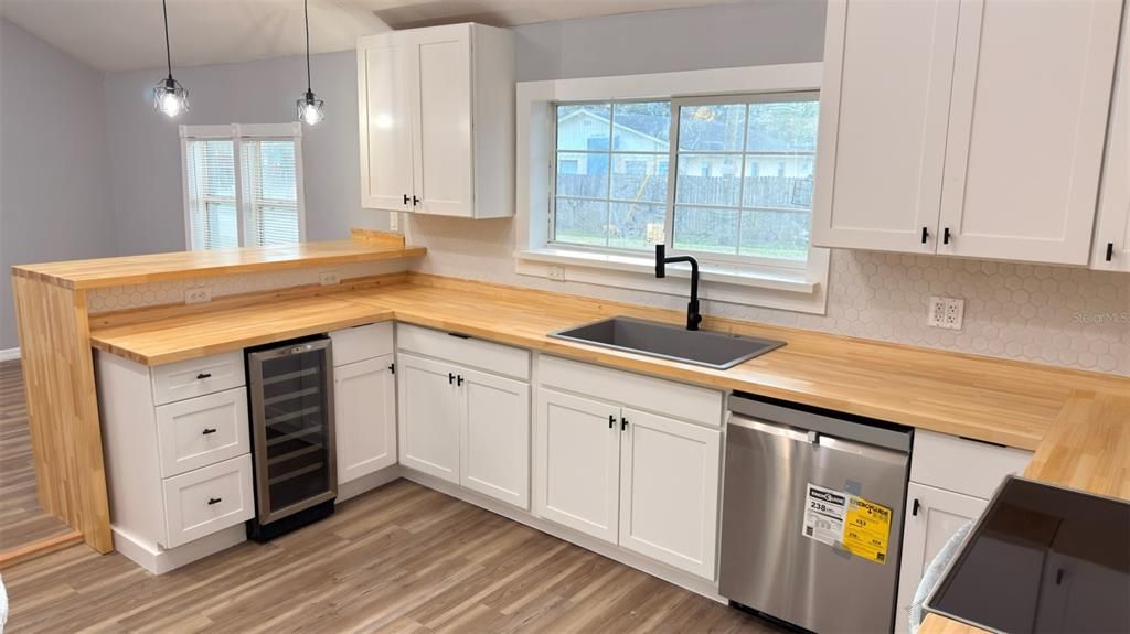 Interior, Kitchen, Pendant Lights, Stainless Steel Appliances, Wood Texture Flooring