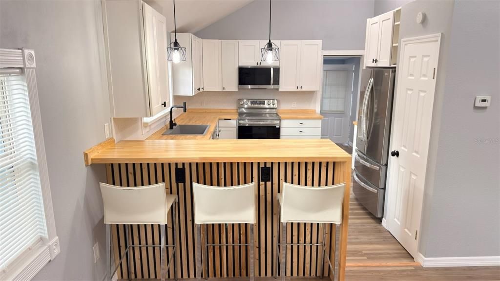 Interior, Kitchen, Pendant Lights, Stainless Steel Appliances, Wood Texture Flooring