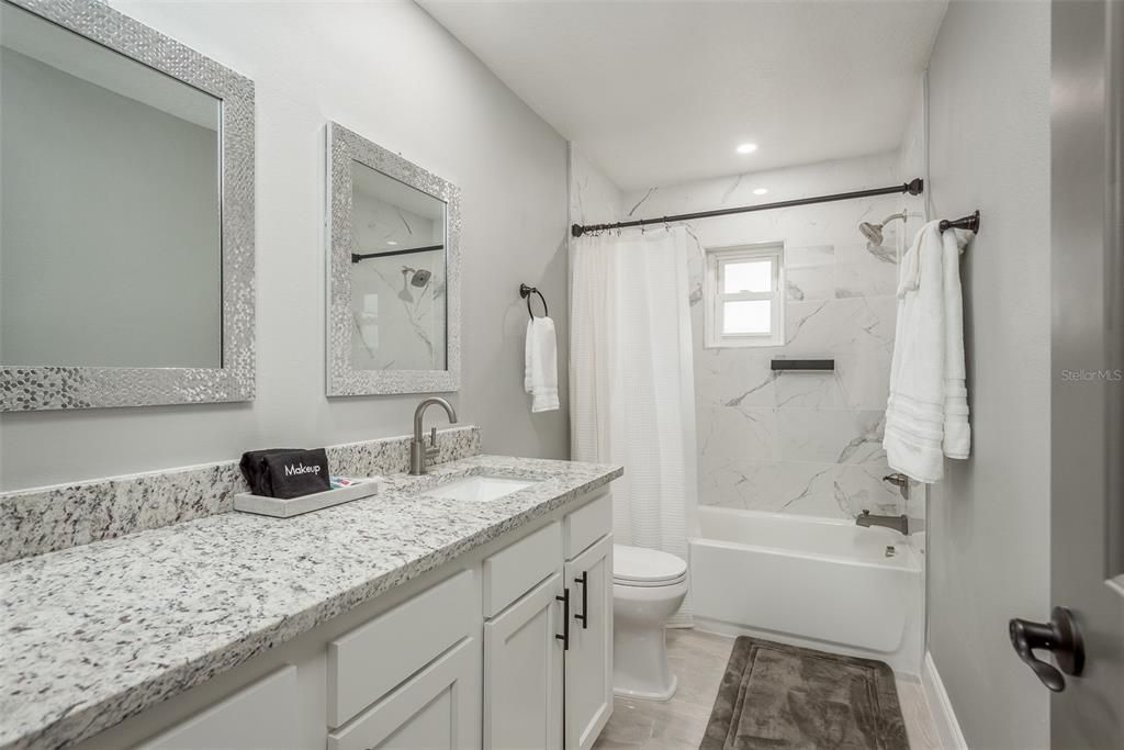 Bathroom, Dual Sink Vanities, Interior, Marble Walls, Recessed Lighting