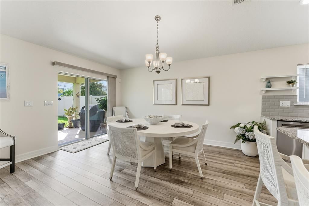 Chandelier, Dining room, Fireplace, Interior, Wood Texture Flooring