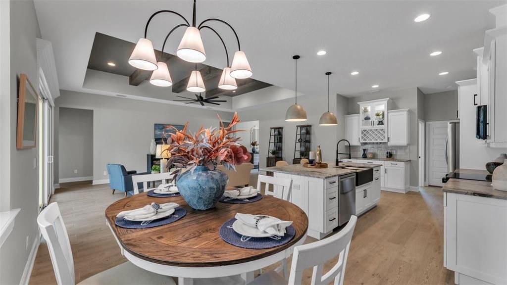 Dining room, Interior, Kitchen, Pendant Lights, Recessed Lighting, Stainless Steel Appliances, Wood Texture Flooring