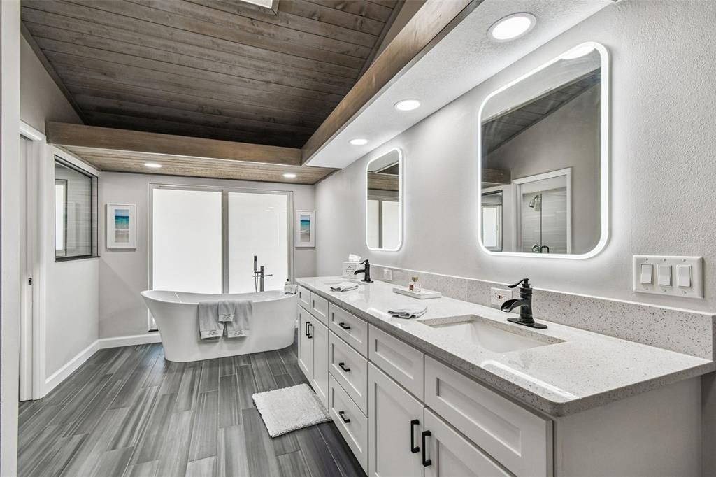 Bathroom, Dual Sink Vanities, Free Standing Baths, Interior, Recessed Lighting, Wooden Ceilings, Wood Texture Flooring
