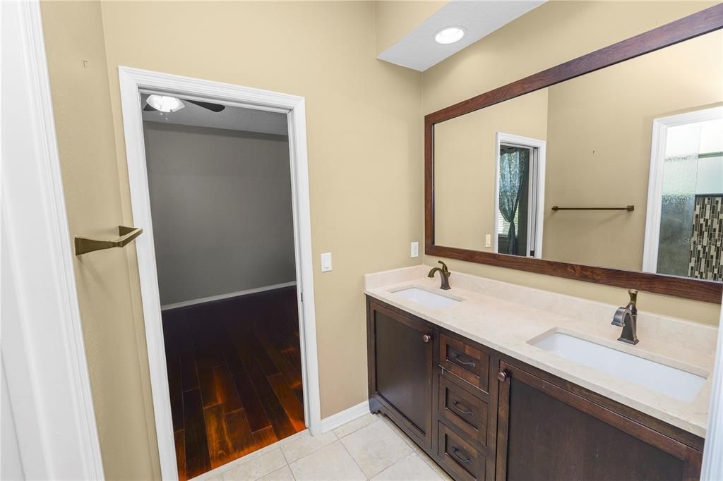 Bathroom, Dual Sink Vanities, Interior, Recessed Lighting, Wood Texture Flooring