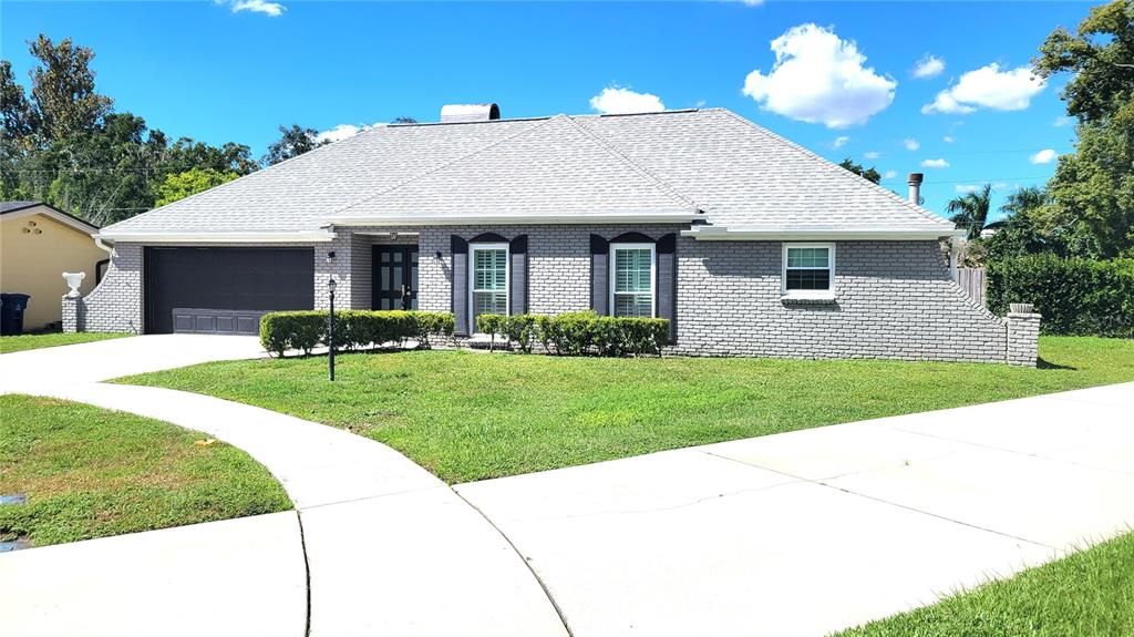 Attached, Backyard, Exterior, Facade, Brick Facade, Cape Cod