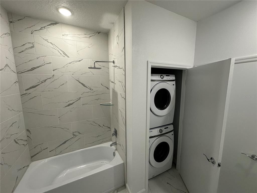 Bathroom, Interior, Marble Walls, Recessed Lighting, Utility Closets, Washer