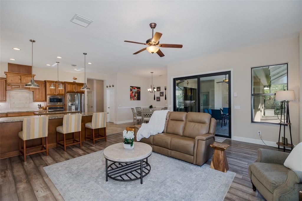 Dining room, Interior, Kitchen, Living room, Pendant Lights, Recessed Lighting, Stainless Steel Appliances, Wood Texture Flooring