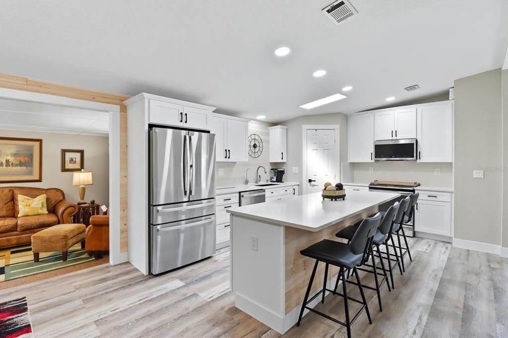 Interior, Kitchen, Living room, Recessed Lighting, Stainless Steel Appliances, Wood Texture Flooring