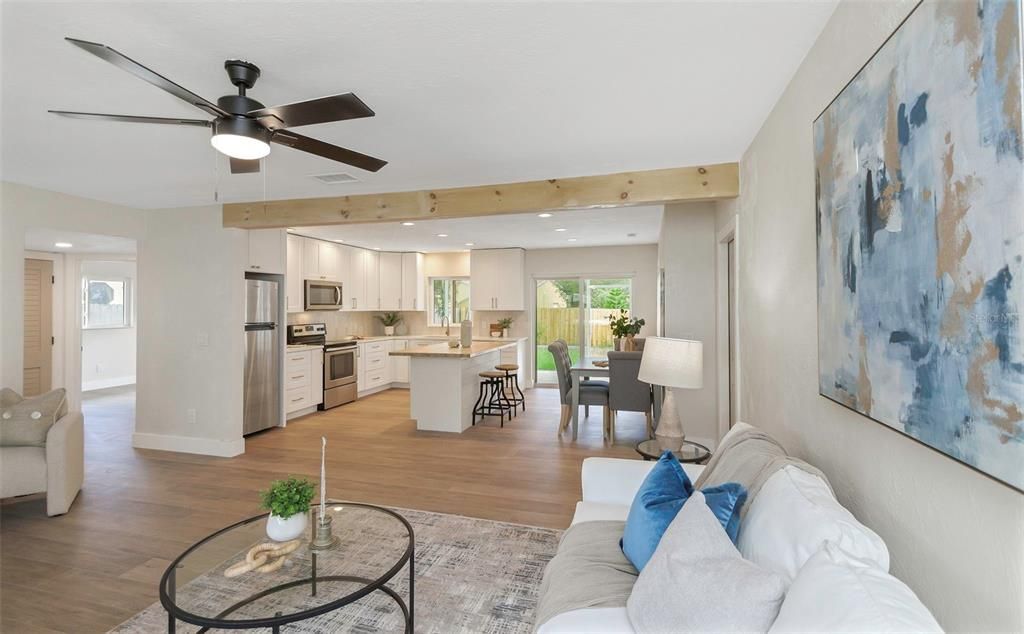 Dining room, Interior, Kitchen, Living room, Recessed Lighting, Stainless Steel Appliances, Wood Texture Flooring