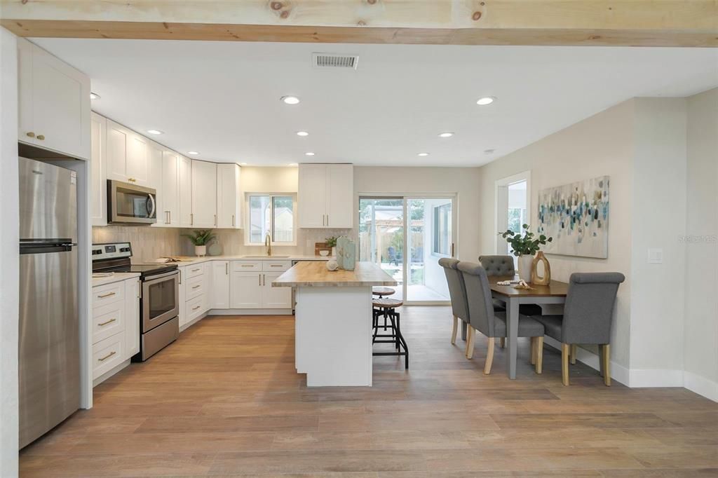 Dining room, Interior, Kitchen, Recessed Lighting, Stainless Steel Appliances, Wooden Beams, Wood Texture Flooring