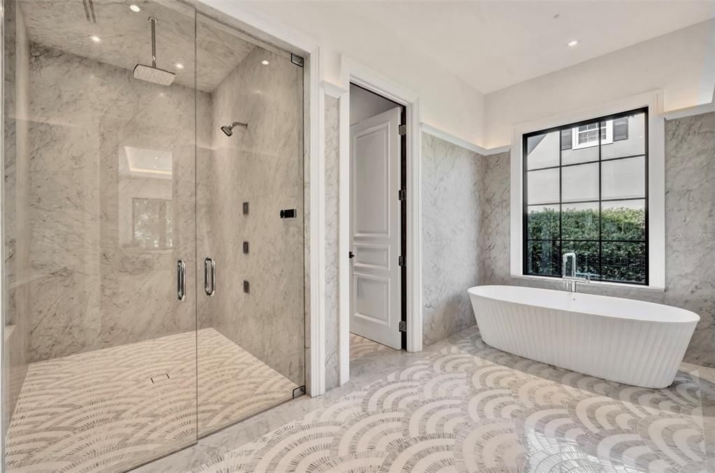 Bathroom, Free Standing Baths, Glass Shower, Interior, Marble Walls, Recessed Lighting