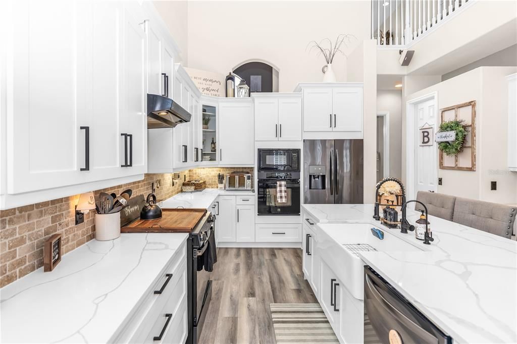 Interior, Kitchen, Recessed Lighting, Stainless Steel Appliances, Stone Walls, Wood Texture Flooring