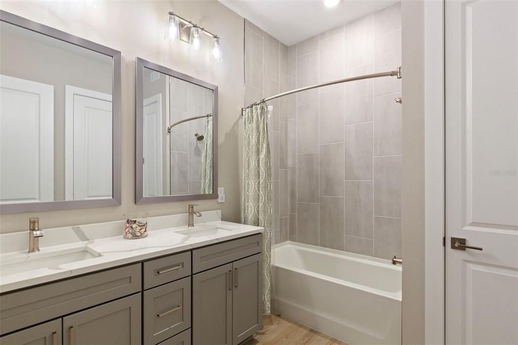 Bathroom, Dual Sink Vanities, Interior, Recessed Lighting, Wood Texture Flooring