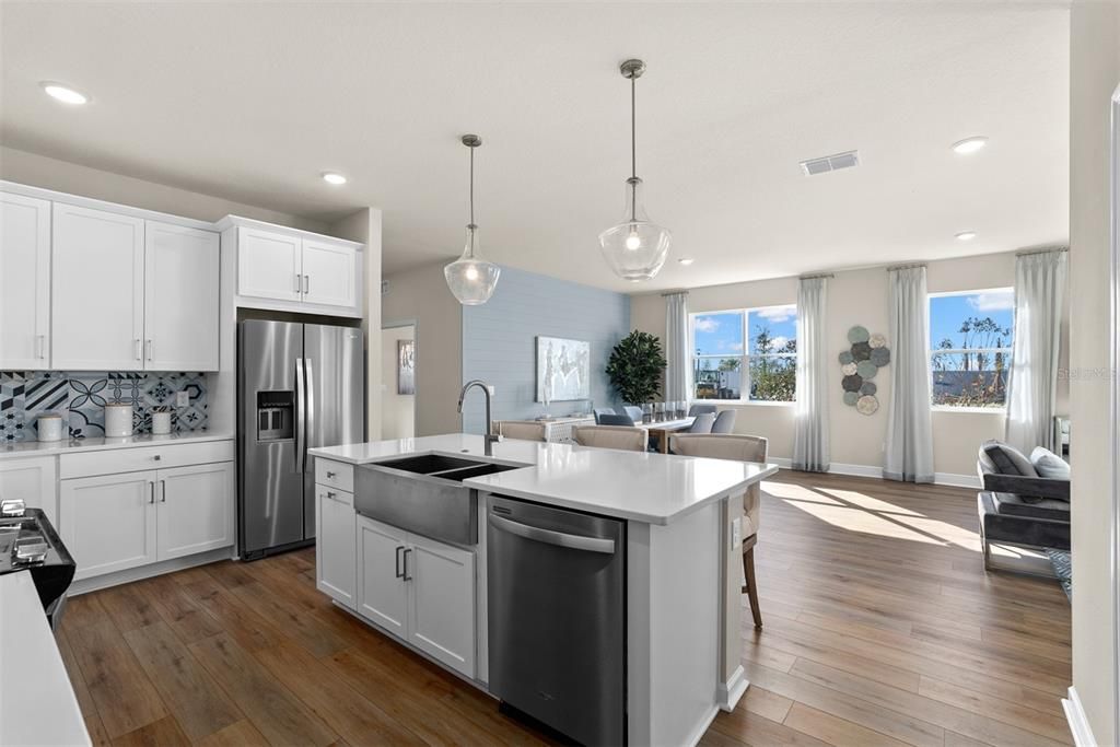 Dining room, Interior, Kitchen, Pendant Lights, Recessed Lighting, Stainless Steel Appliances, Wood Texture Flooring