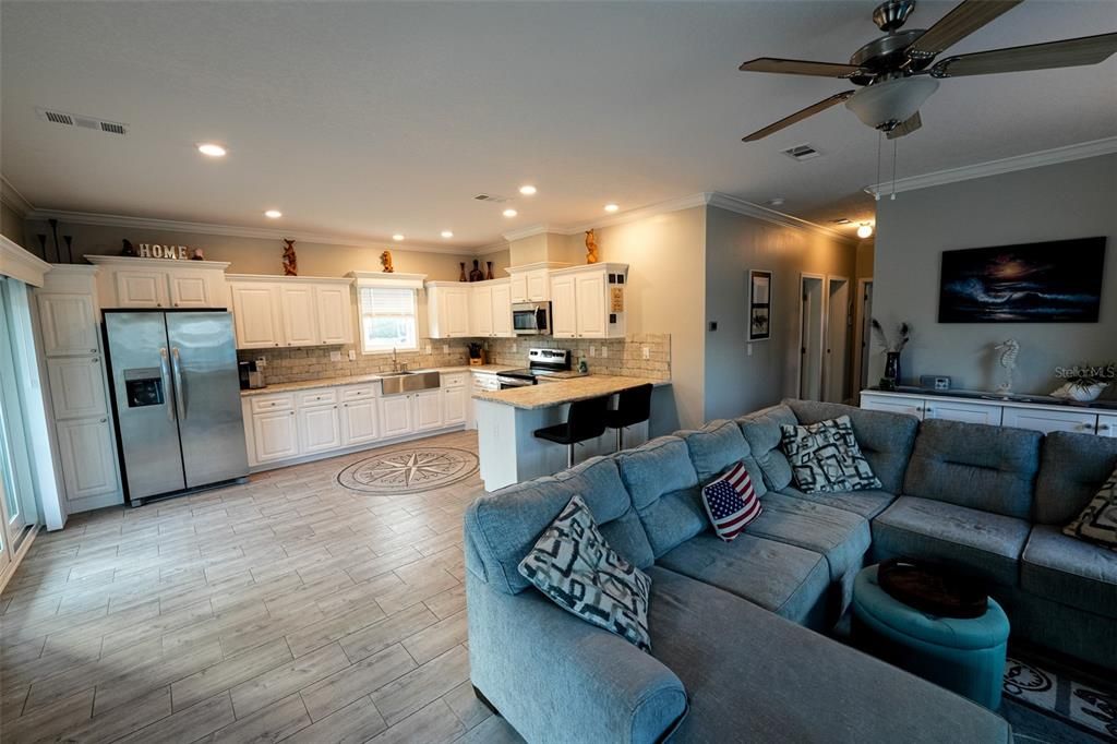 Interior, Kitchen, Living room, Recessed Lighting, Stainless Steel Appliances, Wood Texture Flooring