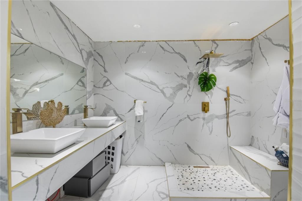 Bathroom, Dual Sink Vanities, Interior, Marble, Marble Walls, Recessed Lighting