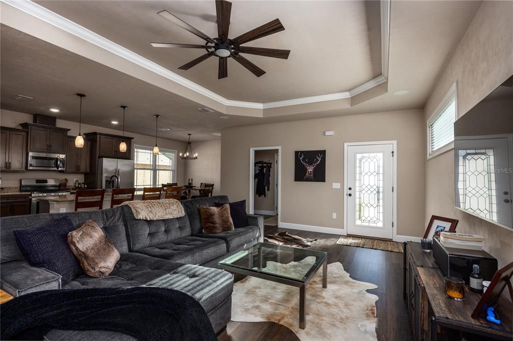 Dining room, Interior, Kitchen, Living room, Pendant Lights, Recessed Lighting, Stainless Steel Appliances, Wood Texture Flooring