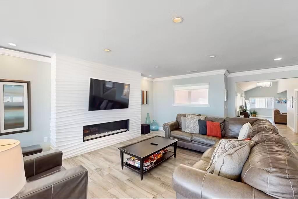 Fireplace, Interior, Living room, Recessed Lighting, Wood Texture Flooring
