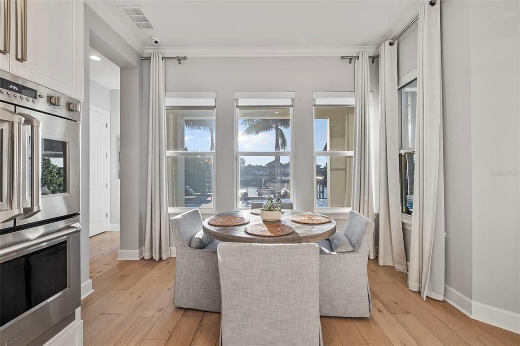 Dining room, Interior, Kitchen, Recessed Lighting, Stainless Steel Appliances, Wood Texture Flooring