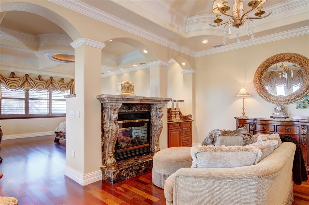 Chandelier, Fireplace, Interior, Living room, Recessed Lighting, Wood Texture Flooring