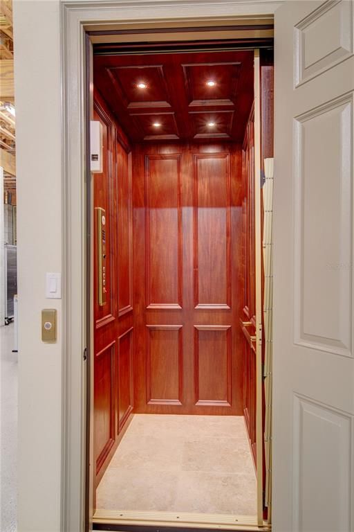 Elevator, Interior, Recessed Lighting, Wooden Ceilings, Wooden Walls
