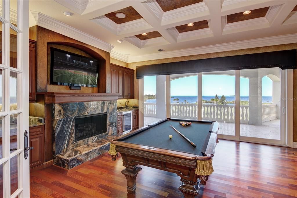 Billiard Table, Fireplace, Game Room, Interior, Recessed Lighting, Water, Wood Texture Flooring