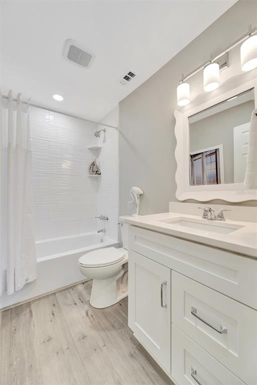 Bathroom, Dual Sink Vanities, Interior, Recessed Lighting, Wood Texture Flooring