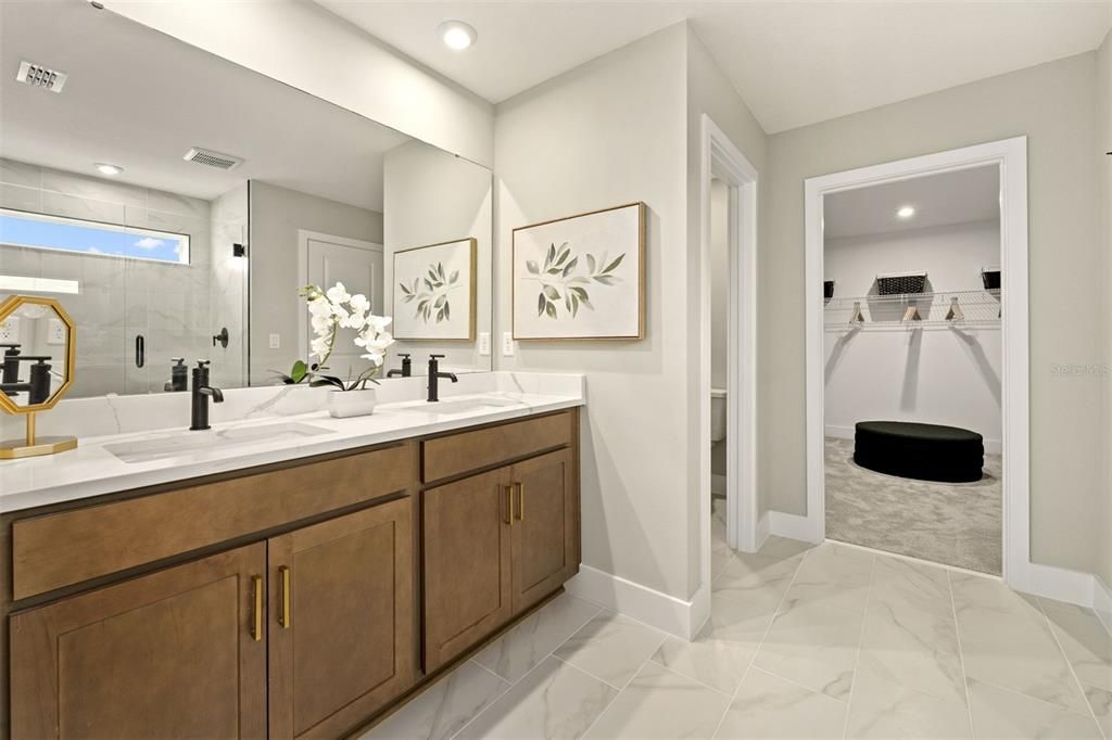 Bathroom, Dual Sink Vanities, Interior, Marble, Recessed Lighting, Walk-in Closets